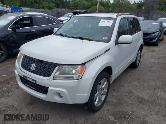 ✅ 2012 Suzuki Grand Vitara Limited • VIN: JS3TD0D70C4101207 • Lot: 42324290. Listed on IAAI with 121,646 mi. Free auction sales archive from the USA and detailed vehicle history report at DreamBid. Image 2.