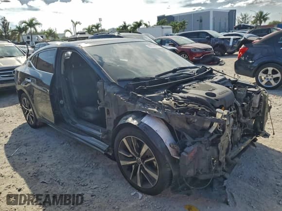 ✅ 2019 Nissan Maxima SL • VIN: 1N4AA6AVXKC365811 • Lot: 95533125. Listed on Copart with 87,369 mi. Free auction sales archive from the USA and detailed vehicle history report at DreamBid. Image 4.