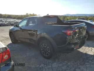 2024 Hyundai Santa Cruz SEL z VIN 5NTJBDAE0RH081096, wystawiony jako Copart lot #75926144 z przebiegiem 9 702 mil mil oraz Szkoda całkowita • Salvage title. Historia ofert i sprzedaży dostępna na DreamBid. Obrazek 2.