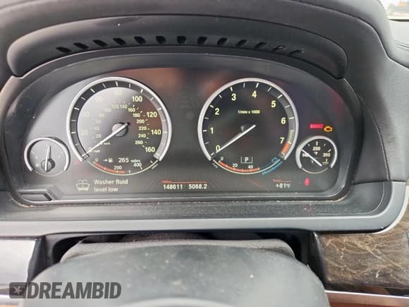 ✅ 2012 BMW 7 Series 740i • VIN: WBAKA4C58CC613438 • Лот: 62981575. Опубликован ранее на Copart с пробегом 148 611 миль. Бесплатный доступ к архиву аукционных продаж из США и подробный отчёт об истории автомобиля на DreamBid. Изображение 9.