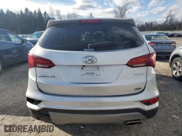 ✅ 2017 Hyundai Santa Fe 2.4L • VIN: 5XYZTDLB8HG438824 • Lot: 93089465. Listed on Copart with 87,905 mi. Free auction sales archive from the USA and detailed vehicle history report at DreamBid. Image 6.