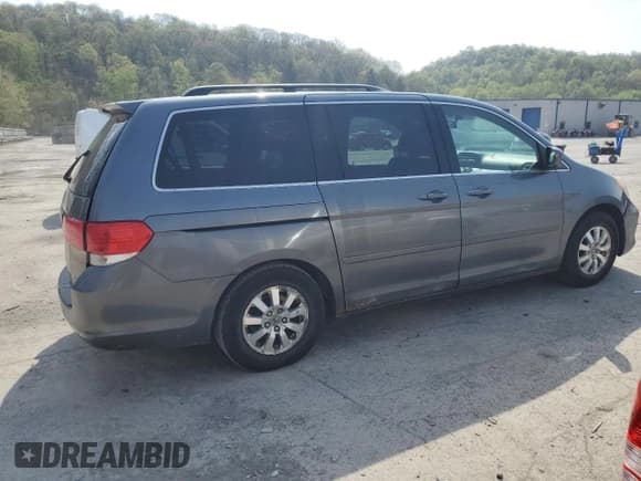✅ 2010 Honda Odyssey EX • VIN: 5FNRL3H48AB011905 • Lot: 54990195. Listed on Copart with 236,506 mi. Free auction sales archive from the USA and detailed vehicle history report at DreamBid. Image 3.