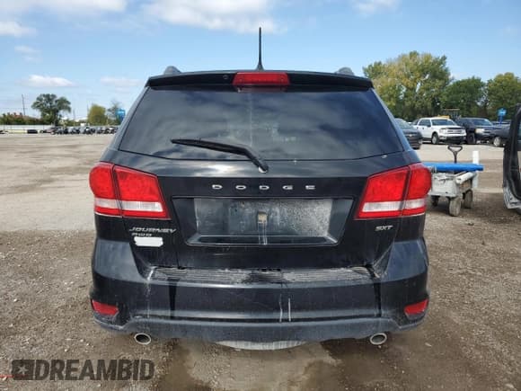 ✅ 2014 Dodge Journey SXT • VIN: 3C4PDDBG4ET211930 • Лот: 85353285. Опубликован ранее на Copart с пробегом 193 753 миль. Бесплатный доступ к архиву аукционных продаж из США и подробный отчёт об истории автомобиля на DreamBid. Изображение 6.