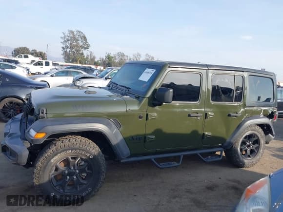 ✅ 2022 Jeep Wrangler Unlimited High Tide • VIN: 1C4HJXDG5NW113205 • Lot: 41488724. Listed on IAAI with 30,446 mi. Free auction sales archive from the USA and detailed vehicle history report at DreamBid. Image 15.
