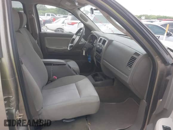 2006 Dodge Dakota SLT with VIN 1D7HE48N16S703072, listed as a IAAI auction lot 42156709 with 102,919 mi miles and . Bid and sale history available at DreamBid. Image 5.