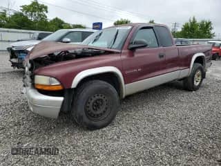 2002 Dodge Dakota SLT с VIN 1B7GL42XX2S525243, выставлен на аукционе Copart как лот 58269695 с пробегом 161 650 миль миль и Списание • Salvage title. История ставок и продаж доступна на DreamBid. Изображение 1.