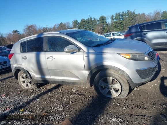 ✅ 2012 Kia Sportage LX • VIN: KNDPBCA26C7249232 • Lot: 43776556. Listed on IAAI with 140,007 mi. Free auction sales archive from the USA and detailed vehicle history report at DreamBid. Image 13.