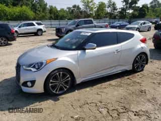 2016 Hyundai Veloster Turbo z VIN KMHTC6AEXGU254380, wystawiony jako Copart lot #60766373 z przebiegiem 135 056 mil mil oraz . Historia ofert i sprzedaży dostępna na DreamBid. Obrazek 1.