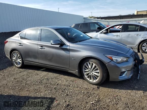 ✅ 2018 Infiniti Q50 Luxe • VIN: JN1EV7AR7JM611296 • Lot: 68939055. Wystawiony na Copart z przebiegiem 75 562 mil. Bezpłatny archiwum sprzedaży aukcyjnych z USA i szczegółowy raport historii pojazdu na DreamBid. Zdjęcie 4.