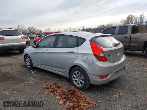 ✅ 2014 Hyundai Accent GS • VIN: KMHCT5AE4EU185824 • Lot: 43672608. Listed on IAAI with 199,283 mi. Free auction sales archive from the USA and detailed vehicle history report at DreamBid. Image 3.