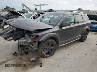 2018 Dodge Journey Crossroad with VIN 3C4PDCGG4JT379273, listed as a Copart auction lot 70452495 with 122,550 mi miles and Salvage title. Bid and sale history available at DreamBid. Image 1.