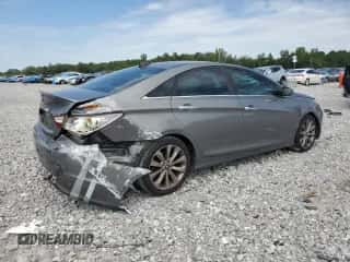 2012 Hyundai Sonata SE with VIN 5NPEC4AC7CH480588, listed as a Copart auction lot 71114035 with 182,328 mi miles and Salvage title. Bid and sale history available at DreamBid. Image 3.