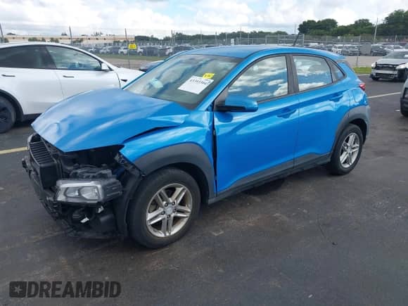 2018 Hyundai Kona SE with VIN KM8K12AA9JU147870, listed as a IAAI auction lot 43393304 with 62,014 mi miles and . Bid and sale history available at DreamBid. Image 2.