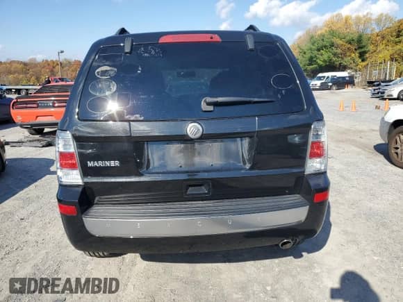 2011 Mercury Mariner с VIN 4M2CN8B78BKJ03563, выставлен на аукционе Copart как лот 90865275 с пробегом 84 082 миль миль и Списание • Salvage title. История ставок и продаж доступна на DreamBid. Изображение 6.