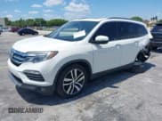 ✅ 2018 Honda Pilot Elite • VIN: 5FNYF6H00JB058623 • Lot: 42323415. Listed on IAAI with 102,015 mi. Free auction sales archive from the USA and detailed vehicle history report at DreamBid. Image 2.