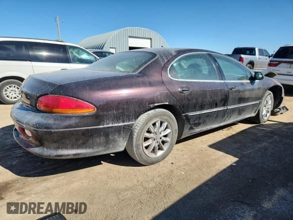 ✅ 2003 Chrysler Concorde Limited • VIN: 2C3HD56G13H550739 • Lot: 82534945. Listed on Copart with 272,677 mi. Free auction sales archive from the USA and detailed vehicle history report at DreamBid. Image 3.