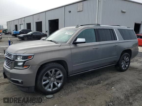 2018 Chevrolet Suburban Premier z VIN 1GNSKJKC7JR128840, wystawiony jako Copart lot #71464134 z przebiegiem 183 380 mil mil oraz Szkoda całkowita • Salvage title. Historia ofert i sprzedaży dostępna na DreamBid. Obrazek 1.