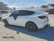 ✅ 2022 Tesla Model Y Performance • VIN: 7SAYGDEF1NF534154 • Lot: 95018475. Listed on Copart with Not provided. Free auction sales archive from the USA and detailed vehicle history report at DreamBid. Image 2.