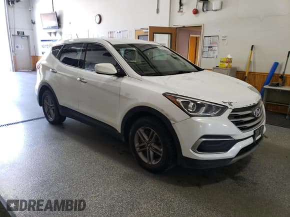✅ 2018 Hyundai Santa Fe 2.4L • VIN: 5NMZT3LB2JH088838 • Lot: 57902485. Listed on Copart with 118,294 mi. Free auction sales archive from the USA and detailed vehicle history report at DreamBid. Image 4.