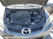 ✅ 2009 Mazda CX-7 Grand Touring • VIN: JM3ER29L090216696 • Lot: 56958805. Listed on Copart with 145,360 mi. Free auction sales archive from the USA and detailed vehicle history report at DreamBid. Image 12.