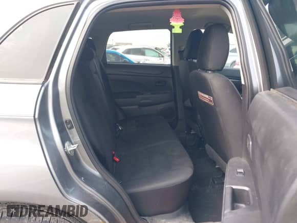 2013 Mitsubishi Outlander ES z VIN 4A4AR3AU8DE011083, wystawiony jako IAAI lot #43124485 z przebiegiem 90 264 mil mil oraz . Historia ofert i sprzedaży dostępna na DreamBid. Obrazek 8.