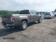 ✅ 2015 GMC Canyon 4WD SLE • VIN: 1GTH6BE3XF1158400 • Lot: 42357226. Listed on IAAI with 127,187 mi. Free auction sales archive from the USA and detailed vehicle history report at DreamBid. Image 4.