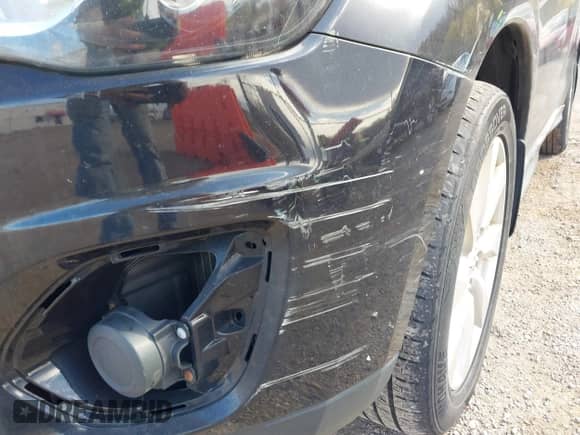 2014 Mitsubishi Outlander ES z VIN 4A4AR3AU0EE005229, wystawiony jako IAAI lot #43621061 z przebiegiem 147 459 mil mil oraz . Historia ofert i sprzedaży dostępna na DreamBid. Obrazek 6.