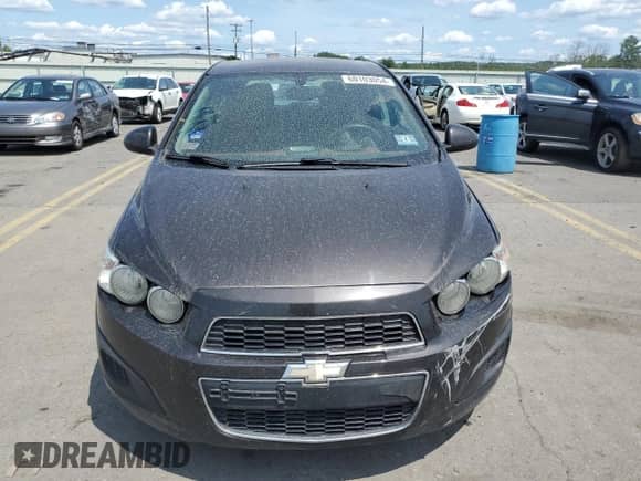 ✅ 2014 Chevrolet Sonic LT • VIN: 1G1JC6SGXE4234261 • Лот: 60103054. Размещён на Copart с пробегом 165 944 миль миль. Получите бесплатный доступ к архиву аукционных продаж из США и посмотрите подробный отчёт об истории автомобиля на DreamBid. Изображение 5.