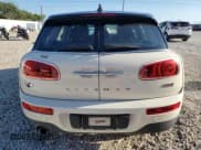 ✅ 2017 MINI Clubman Cooper • VIN: WMWLN5C58H2E32211 • Lot: 69659435. Wystawiony na Copart z przebiegiem 45 175 mil. Bezpłatny archiwum sprzedaży aukcyjnych z USA i szczegółowy raport historii pojazdu na DreamBid. Zdjęcie 6.