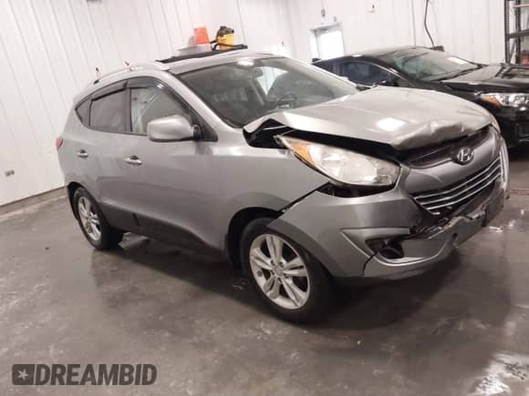 2011 Hyundai Tucson GLS z VIN KM8JU3AC7BU262415, wystawiony jako IAAI lot #43439786 z przebiegiem 88 234 mil mil oraz . Historia ofert i sprzedaży dostępna na DreamBid. Obrazek 1.
