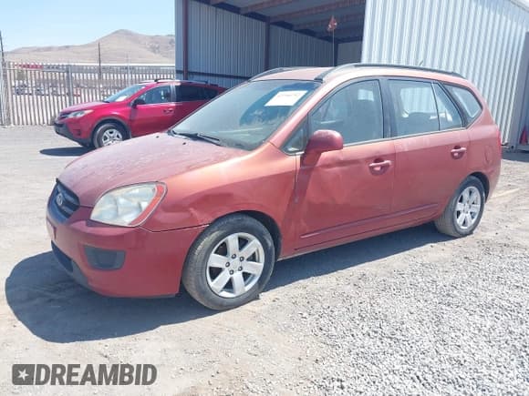 ✅ 2008 Kia Rondo LX • VIN: KNAFG526787125596 • Lot: 42750792. Wystawiony na IAAI z przebiegiem 230 782 mil. Bezpłatny archiwum sprzedaży aukcyjnych z USA i szczegółowy raport historii pojazdu na DreamBid. Zdjęcie 2.