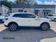 ✅ 2021 Lincoln Nautilus Reserve • VIN: 2LMPJ8K90MBL12748 • Lot: 96729675. Listed on Copart with 15,723 mi. Free auction sales archive from the USA and detailed vehicle history report at DreamBid. Image 13.