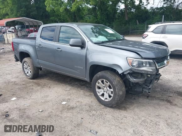✅ 2020 Chevrolet Colorado 2WD LT • VIN: 1GCGSCEN4L1100910 • Lot: 42461493. Listed on IAAI with 87,000 mi. Free auction sales archive from the USA and detailed vehicle history report at DreamBid. Image 1.