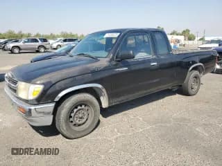 ✅ 1998 Toyota Tacoma • VIN: 4TAVL52N1WZ077138 • Лот: 71229225. Опубликован ранее на Copart с пробегом 215 989 миль. Бесплатный доступ к архиву аукционных продаж из США и подробный отчёт об истории автомобиля на DreamBid. Изображение 1.