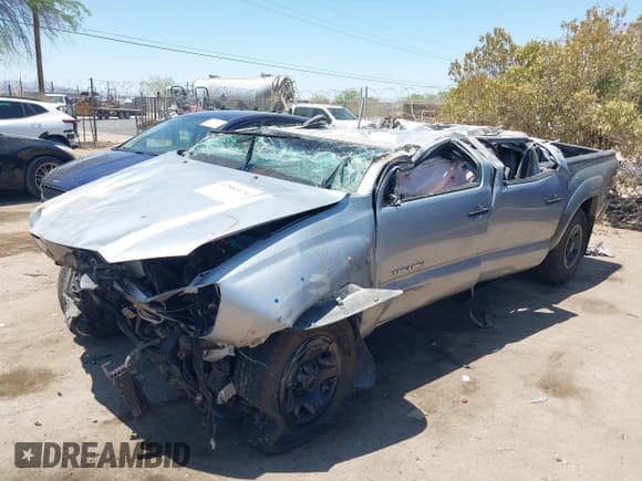 ✅ 2015 Toyota Tacoma PreRunner • VIN: 5TFKU4HNXFX005985 • Lot: 42583474. Listed on IAAI with 160,000 mi. Free auction sales archive from the USA and detailed vehicle history report at DreamBid. Image 2.