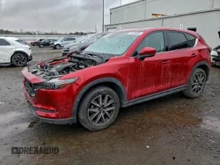 ✅ 2018 Mazda CX-5 Grand Touring • VIN: JM3KFADM0J0313519 • Lot: 95748985. Listed on Copart with 102,239 mi. Free auction sales archive from the USA and detailed vehicle history report at DreamBid. Image 1.
