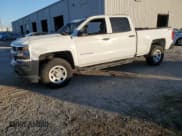 ✅ 2018 Chevrolet Silverado 1500 LS • VIN: 3GCUKNEC7JG448776 • Лот: 81851164. Опубликован ранее на Copart с пробегом 125 467 миль. Бесплатный доступ к архиву аукционных продаж из США и подробный отчёт об истории автомобиля на DreamBid. Изображение 1.