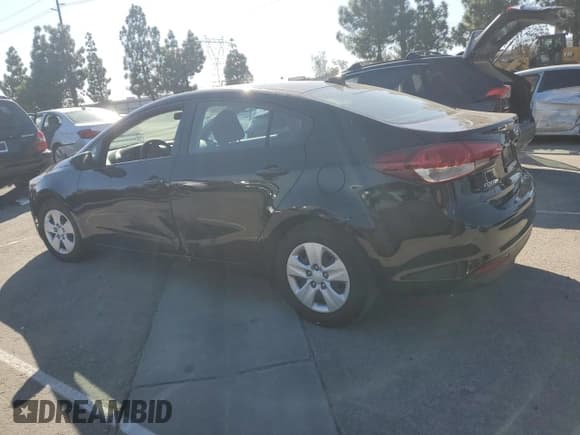 ✅ 2018 Kia Forte LX • VIN: 3KPFL4A7XJE249046 • Лот: 82673485. Опубликован ранее на Copart с пробегом 51 067 миль. Бесплатный доступ к архиву аукционных продаж из США и подробный отчёт об истории автомобиля на DreamBid. Изображение 2.