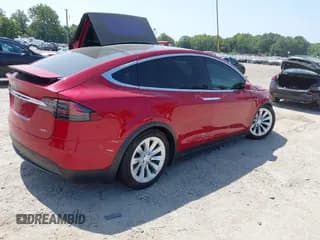 ✅ 2017 Tesla Model X 90D • VIN: 5YJXCBE27HF066165 • Lot: 42931080. Listed on IAAI with 94,578 mi. Free auction sales archive from the USA and detailed vehicle history report at DreamBid. Image 4.
