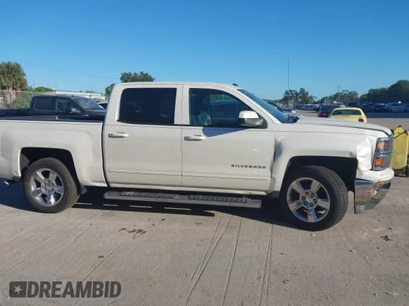2015 Chevrolet Silverado 1500 LT z VIN 3GCPCREC6FG332798, wystawiony jako IAAI lot #43461490 z przebiegiem 57 078 mil mil oraz . Historia ofert i sprzedaży dostępna na DreamBid. Obrazek 13.