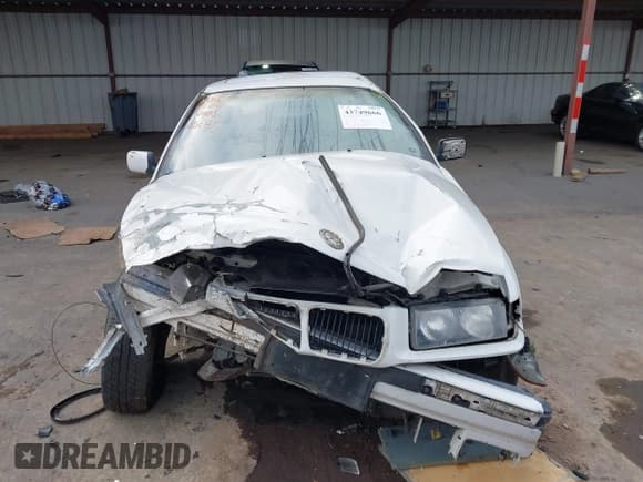 ✅ 1998 BMW 3 Series 318i • VIN: WBACC0324WEK27301 • Лот: 43749666. Опубликован ранее на IAAI с пробегом 224 555 миль. Бесплатный доступ к архиву аукционных продаж из США и подробный отчёт об истории автомобиля на DreamBid. Изображение 13.