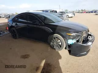 ✅ 2023 Mazda 3 Premium Plus • VIN: 3MZBPBEY6PM350056 • Lot: 41940111. Listed on IAAI with 27,091 mi. Free auction sales archive from the USA and detailed vehicle history report at DreamBid. Image 1.