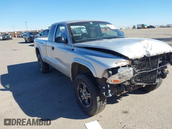 ✅ 2004 Dodge Dakota • VIN: 1D7HG12KX4S713541 • Lot: 43611680. Wystawiony na IAAI z przebiegiem 186 687 mil. Bezpłatny archiwum sprzedaży aukcyjnych z USA i szczegółowy raport historii pojazdu na DreamBid. Zdjęcie 1.