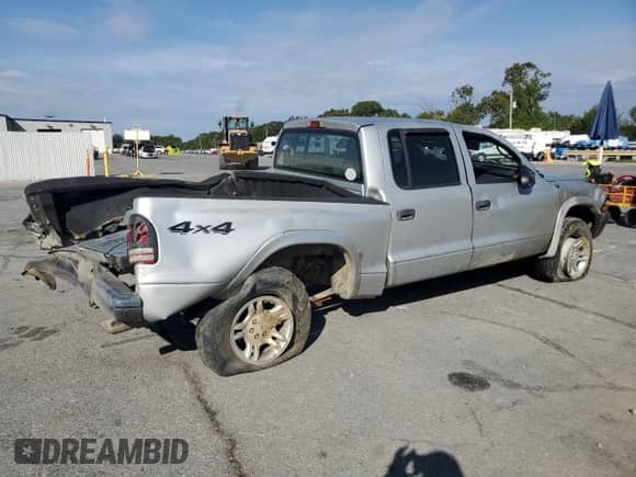 2004 Dodge Dakota Sport с VIN 1D7HG38N34S770063, выставлен на аукционе Copart как лот 71457315 с пробегом 320 703 миль миль и Списание • Salvage title. История ставок и продаж доступна на DreamBid. Изображение 3.