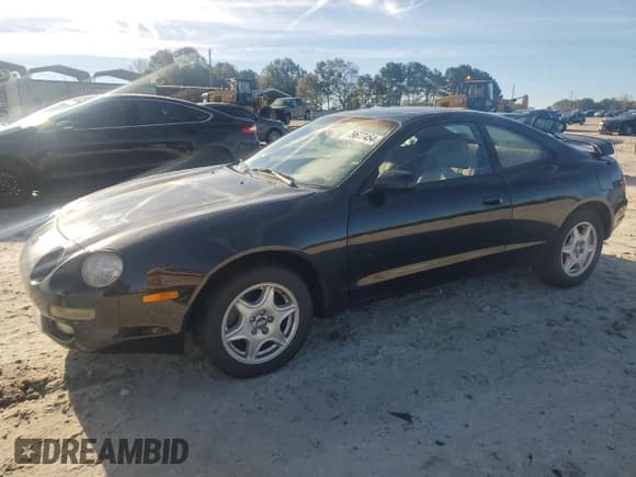 ✅ 1997 Toyota Celica GT • VIN: JT2DG02TXV0040610 • Lot: 79677454. Wystawiony na Copart z przebiegiem 179 749 mil. Bezpłatny archiwum sprzedaży aukcyjnych z USA i szczegółowy raport historii pojazdu na DreamBid. Zdjęcie 1.