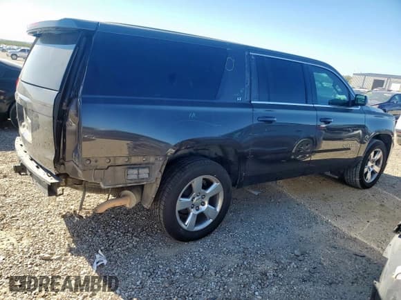 ✅ 2015 Chevrolet Suburban LT • VIN: 1GNSCJKC1FR300090 • Lot: 91886565. Listed on Copart with 221,589 mi. Free auction sales archive from the USA and detailed vehicle history report at DreamBid. Image 3.