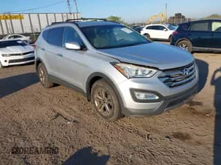 2015 Hyundai Santa Fe z VIN 5XYZU3LB3FG248594, wystawiony jako IAAI lot #43379738 z przebiegiem 135 054 mil mil oraz . Historia ofert i sprzedaży dostępna na DreamBid. Obrazek 1.