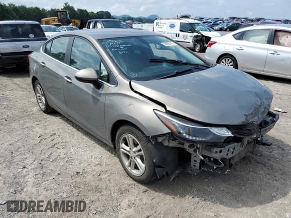 ✅ 2018 Chevrolet Cruze LT • VIN: 1G1BE5SM0J7129249 • Lot: 58995413. Listed on Copart with Not provided. Free auction sales archive from the USA and detailed vehicle history report at DreamBid. Image 4.