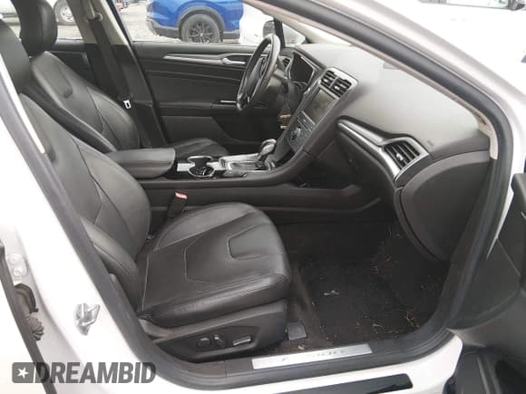 ✅ 2014 Ford Fusion Titanium • VIN: 3FA6P0SU6ER397622 • Lot: 43816342. Listed on IAAI with 121,145 mi. Free auction sales archive from the USA and detailed vehicle history report at DreamBid. Image 5.