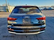 ✅ 2021 Audi Q3 Premium • VIN: WA1AUCF30M1148722 • Lot: 94169065. Wystawiony na Copart z przebiegiem 58 049 mil. Bezpłatny archiwum sprzedaży aukcyjnych z USA i szczegółowy raport historii pojazdu na DreamBid. Zdjęcie 6.